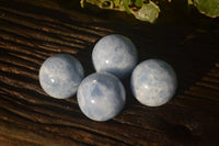 Polished Blue Calcite Spheres x 4 From Ihadilalana, Madagascar