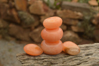 Polished Small Orange Twist Calcite Gallets / Palm Stones - sold per 1 kg - From Maevantanana, Madagascar - TopRock