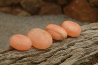 Polished Small Orange Twist Calcite Gallets / Palm Stones - sold per 1 kg - From Maevantanana, Madagascar - TopRock