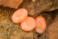 Polished Small Orange Twist Calcite Gallets / Palm Stones - sold per 1 kg - From Maevantanana, Madagascar - TopRock