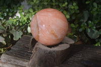 Polished Large Orange Twist Calcite Sphere x 1 From Maevantanana, Madagascar