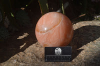 Polished Large Orange Twist Calcite Sphere x 1 From Maevantanana, Madagascar