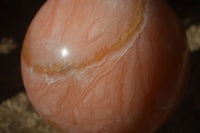 Polished Large Orange Twist Calcite Sphere x 1 From Maevantanana, Madagascar