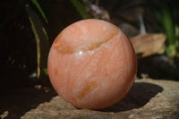 Polished Large Orange Twist Calcite Sphere x 1 From Maevantanana, Madagascar