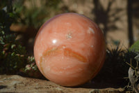 Polished Large Orange Twist Calcite Sphere x 1 From Maevantanana, Madagascar