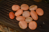 Polished Orange Twist Calcite Galets / Palm Stones x 12 From Maevantanana, Madagascar