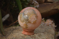 Polished Orange Twist Calcite Sphere x 1 From Maevantanana, Madagascar