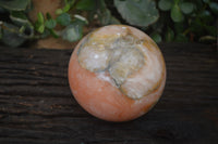 Polished Orange Twist Calcite Sphere x 1 From Maevantanana, Madagascar