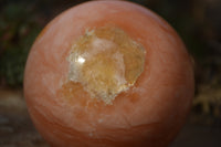 Polished Orange Twist Calcite Sphere x 1 From Maevantanana, Madagascar