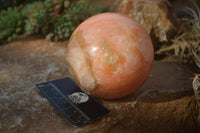 Polished Orange Twist Calcite Sphere x 1 From Maevantanana, Madagascar