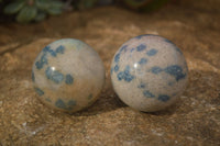 Polished Blue Spotted Spinel Quartz Spheres x 8 From Madagascar