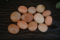 Polished Orange Twist Calcite Palm Stones  x 12 From Madagascar - Toprock Gemstones and Minerals 