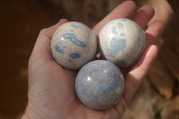 Polished Blue Spotted Spinel Quartz Spheres x 12 From Madagascar