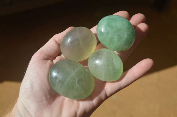 Polished Gemmy Emerald Fluorite Palm Stones  x 12 From Madagascar