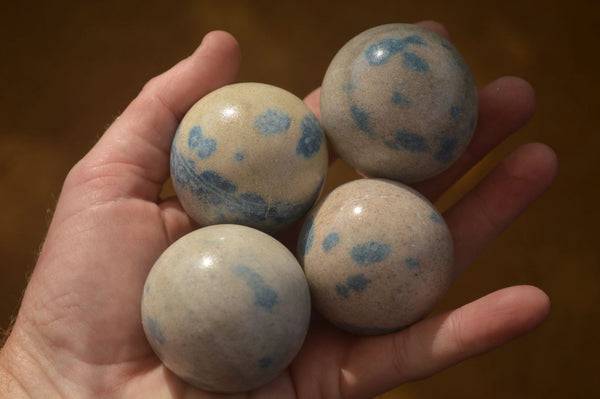 Polished Blue Spotted Spinel Quartz Spheres x 12 From Madagascar