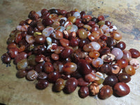 Polished Bright Red/ Orange Small to Medium Sized Carnelian Agate Palm Stones / Gallets - sold per kg - From Madagascar - TopRock