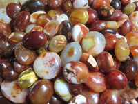 Polished Bright Red/ Orange Small to Medium Sized Carnelian Agate Palm Stones / Gallets - sold per kg - From Madagascar - TopRock