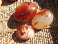 Polished Bright Red/ Orange Small to Medium Sized Carnelian Agate Palm Stones / Gallets - sold per kg - From Madagascar - TopRock