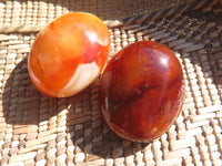 Polished Bright Red/ Orange Small to Medium Sized Carnelian Agate Palm Stones / Gallets - sold per kg - From Madagascar - TopRock