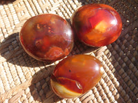 Polished Bright Red/ Orange Small to Medium Sized Carnelian Agate Palm Stones / Gallets - sold per kg - From Madagascar - TopRock