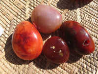 Polished Bright Red/ Orange Small to Medium Sized Carnelian Agate Palm Stones / Gallets - sold per kg - From Madagascar - TopRock