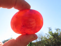 Polished Bright Red/ Orange Small to Medium Sized Carnelian Agate Palm Stones / Gallets - sold per kg - From Madagascar - TopRock