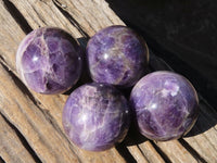 Polished Chevron Amethyst Spheres x 4 From Zambia