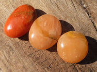 Polished Orange Twist Calcite Galets / Palm Stones x 12 From Maevantanana, Madagascar