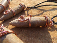 Polished Belemnite Bullet Fossil Rostrums In Copper Art Wire Wrap Pendant - sold per piece From Madagascar - TopRock