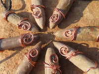 Polished Belemnite Bullet Fossil Rostrums In Copper Art Wire Wrap Pendant - sold per piece From Madagascar - TopRock