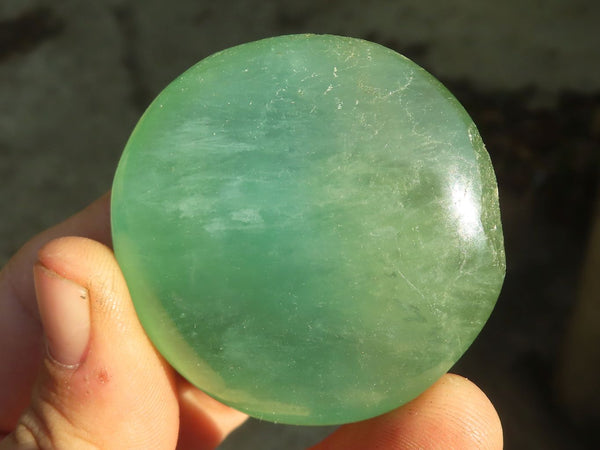 Polished Gemmy Emerald Fluorite Palm Stones  x 12 From Mandrosonoro, Madagascar