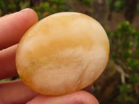 Polished Orange Twist Calcite Galets / Palm Stones x 20 From Maevantanana, Madagascar