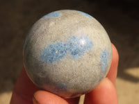 Polished Blue Spotted Spinel Quartz Spheres x 12 From Madagascar