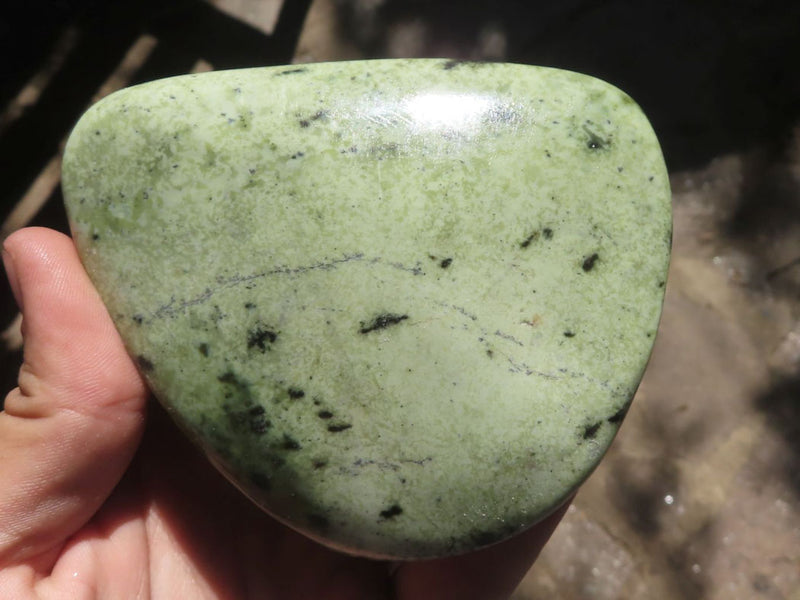 Green stone deals with black specks