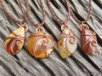 Polished Selected Carnelian Jewellery Free Forms set with Wire Wrap Copper Art Pendant & braided Thong - Sold per Piece - From Madagascar - TopRock