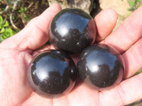 Polished Small to Medium Sized Black Basalt Spheres x 12 From Madagascar - TopRock