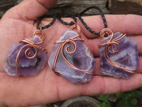 Polished Amethyst Slices Of Crystals Set In Copper Art Wire Wrap Pendant - sold per piece From Zambia - TopRock